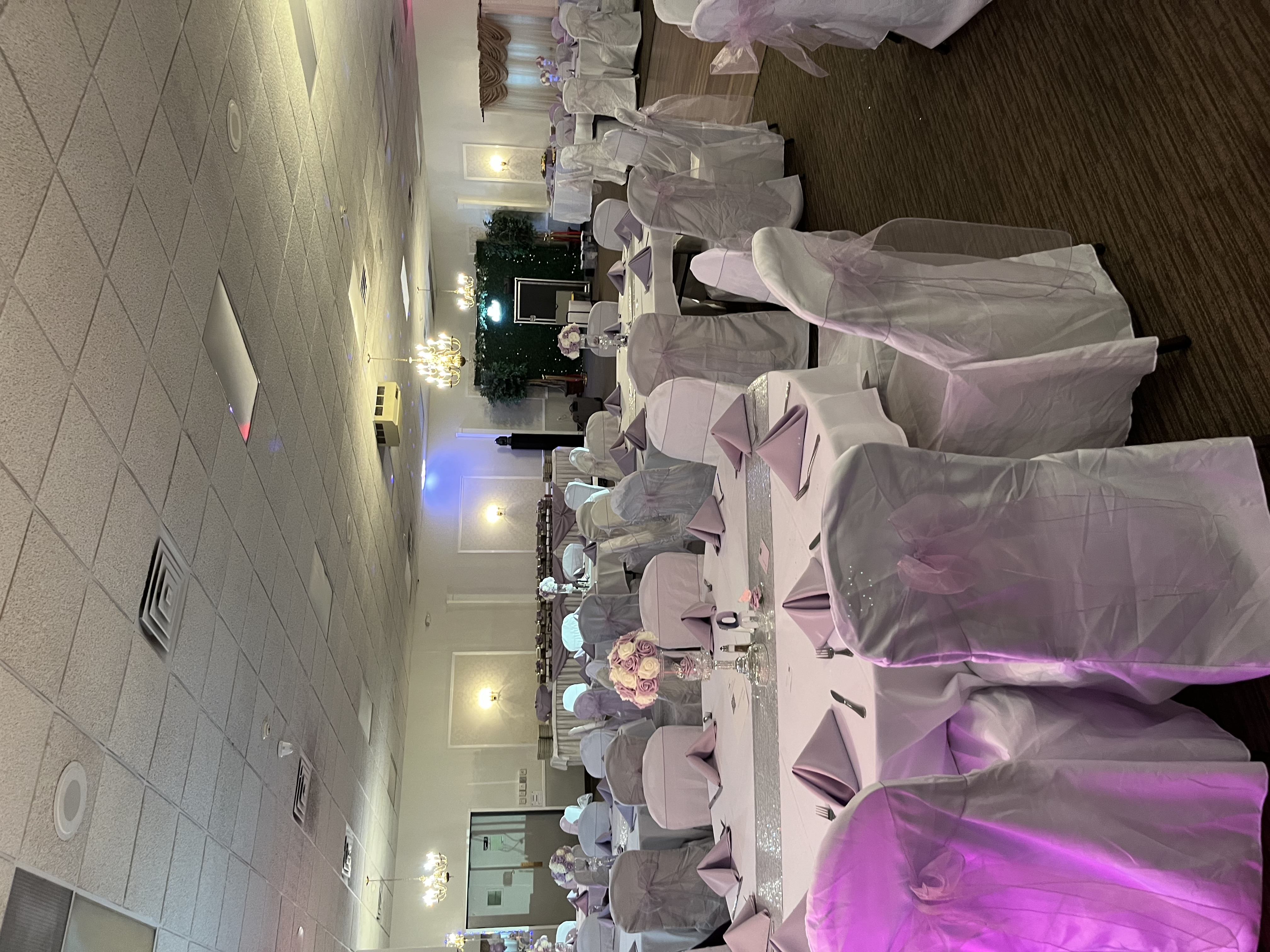 Reception room with purple napkins